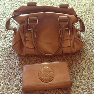 Two Michael khors purses.